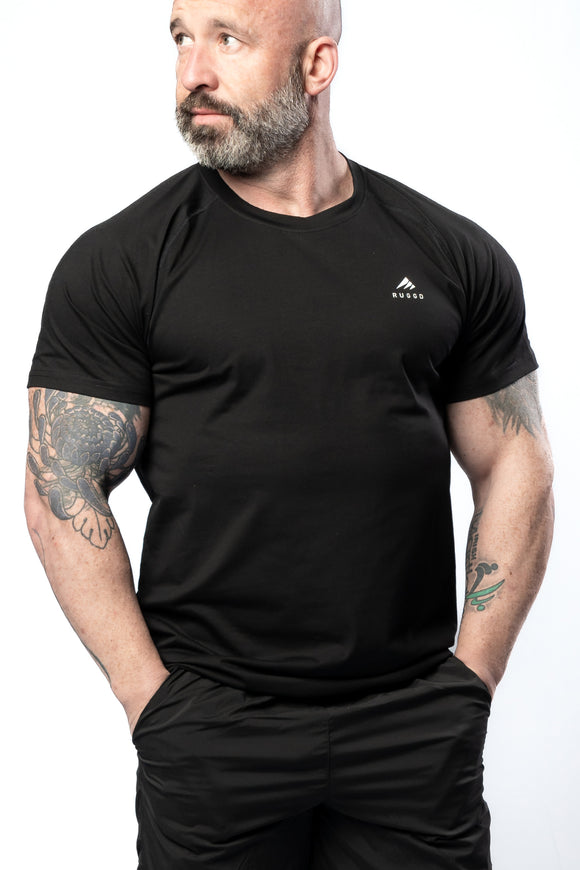 Men's Essential Tee - Black, ideal for casual and active wear. Ruggd