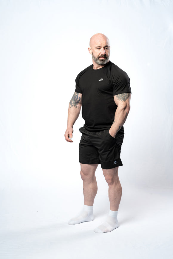 Essential Tee - Black Men's, perfect for everyday wear and layering. Ruggd